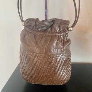 Vintage Gucci woven brown leather drawstring small crossbody